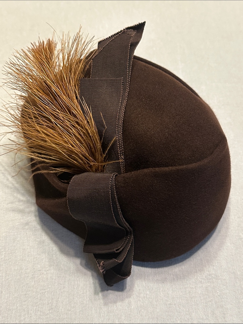 Vintage Women's Brown Felt Pillbox Hat with Feather Accent and Satin Ribbon